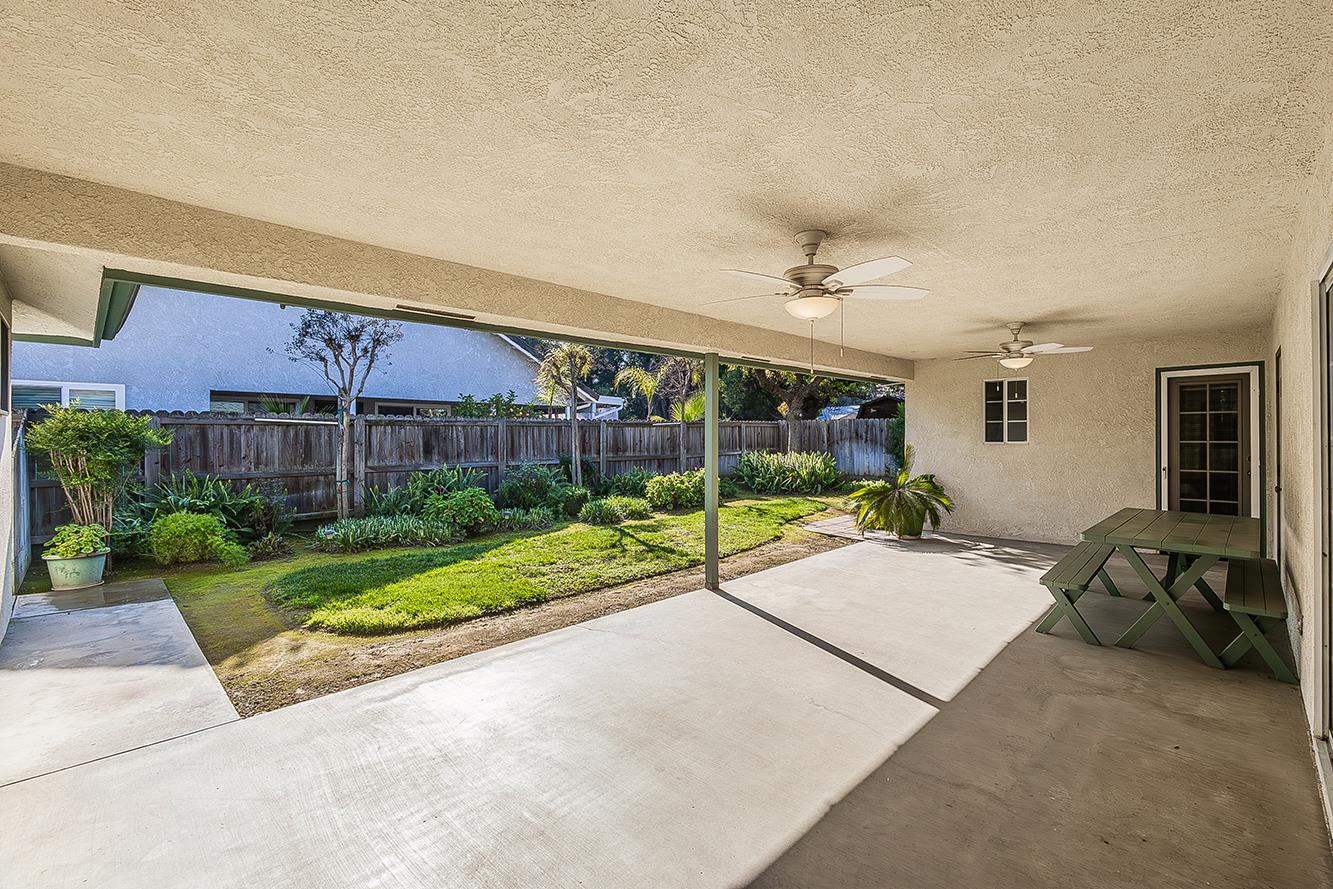 1415 West Riverglen Avenue Reedley, CA 93654 - Photo 30 of 48 a house view with a garden space