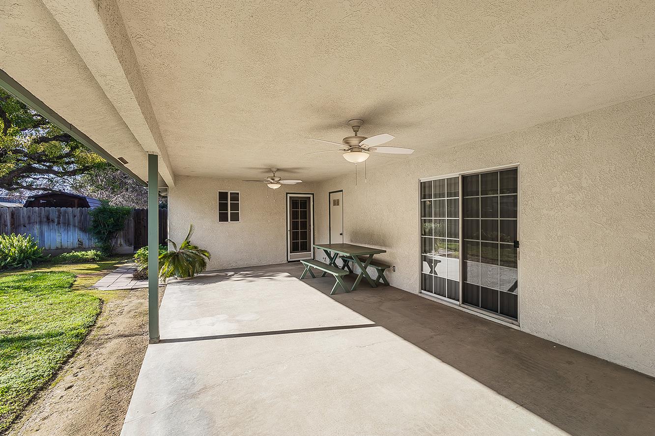 1415 West Riverglen Avenue Reedley, CA 93654 - Photo 31 of 48 a view of a house with a patio