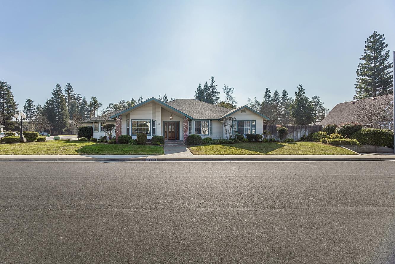 1415 West Riverglen Avenue Reedley, CA 93654 - Photo 46 of 48 a view of swimming pool with outdoor seating and yard