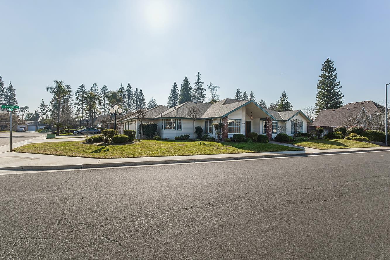 1415 West Riverglen Avenue Reedley, CA 93654 - Photo 47 of 48 a view of a house with a outdoor space