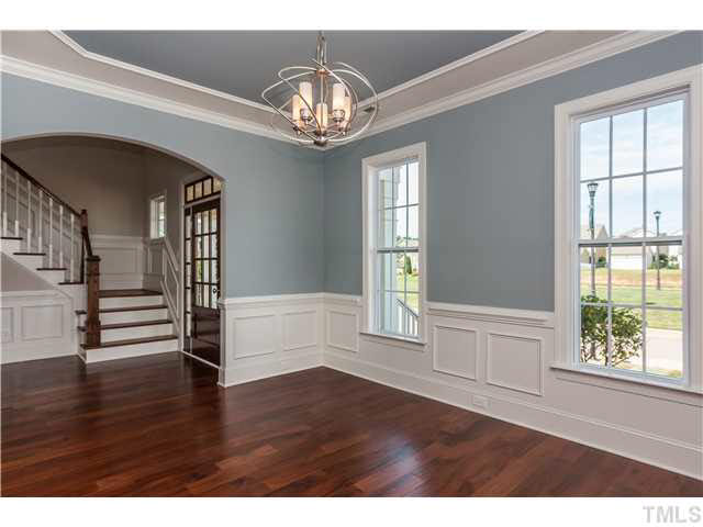 1345 Revolution Circle Raleigh, NC 27603 - Photo 6 of 20 a view of an empty room with wooden floor and a window