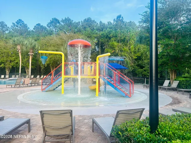 swimming pool with outdoor seating