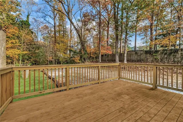 a view of a balcony with trees