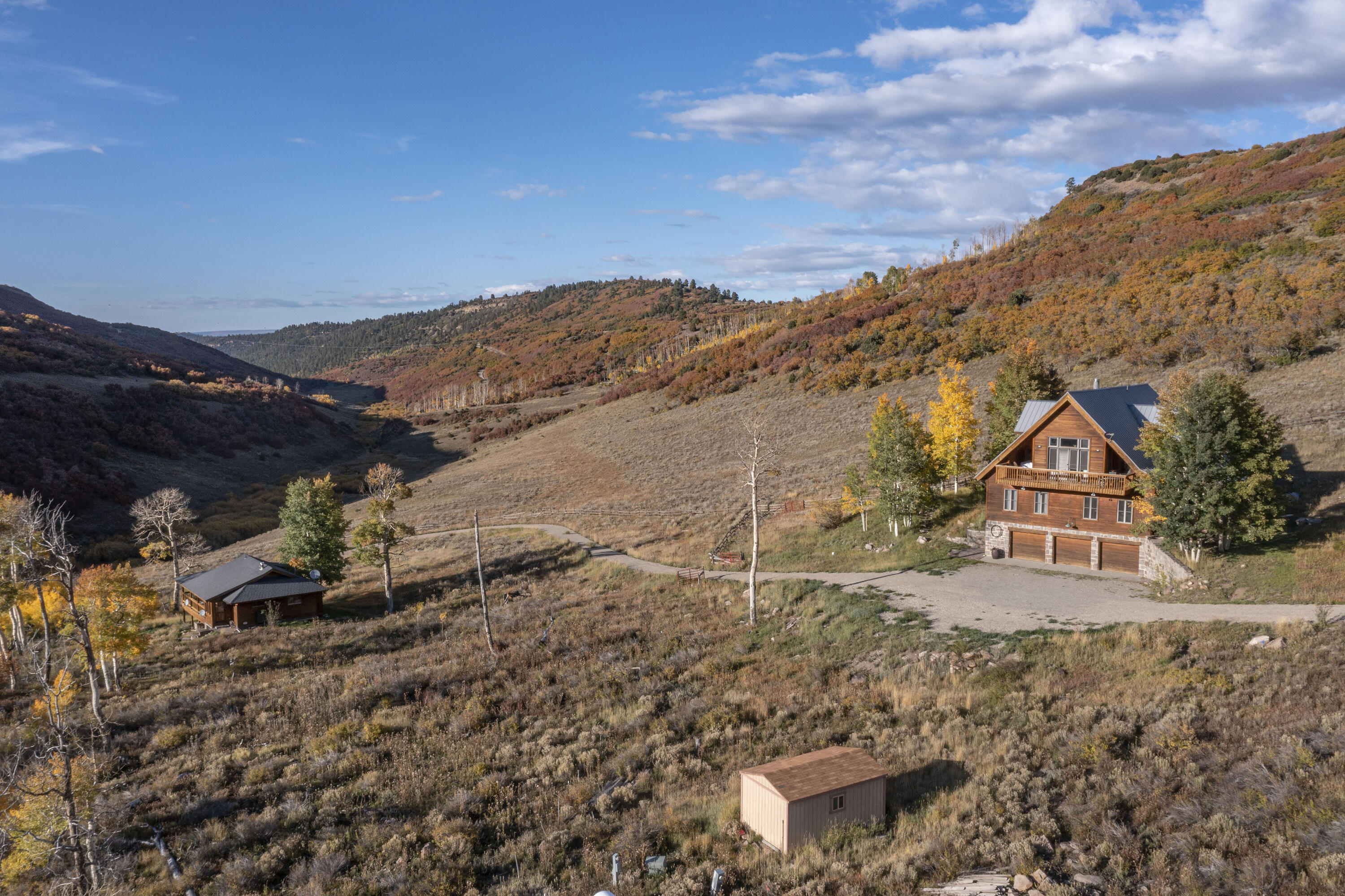 5109 County Road Placerville, CO 81430 - Photo 2 of 13 a view of a house with a mountain