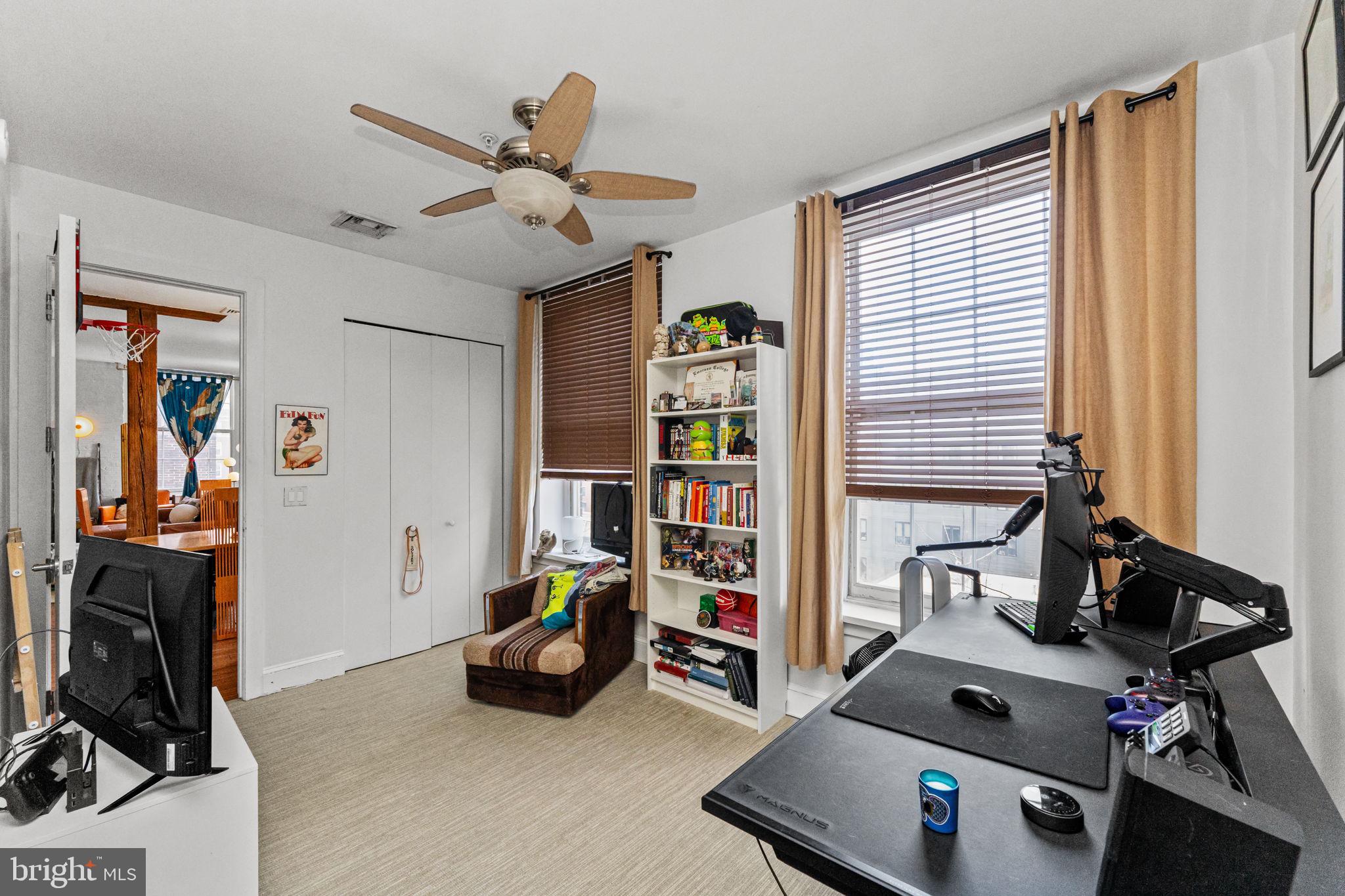 214 New Street, Unit G Philadelphia, PA 19106 - Photo 15 of 17 a room with furniture and gym equipment