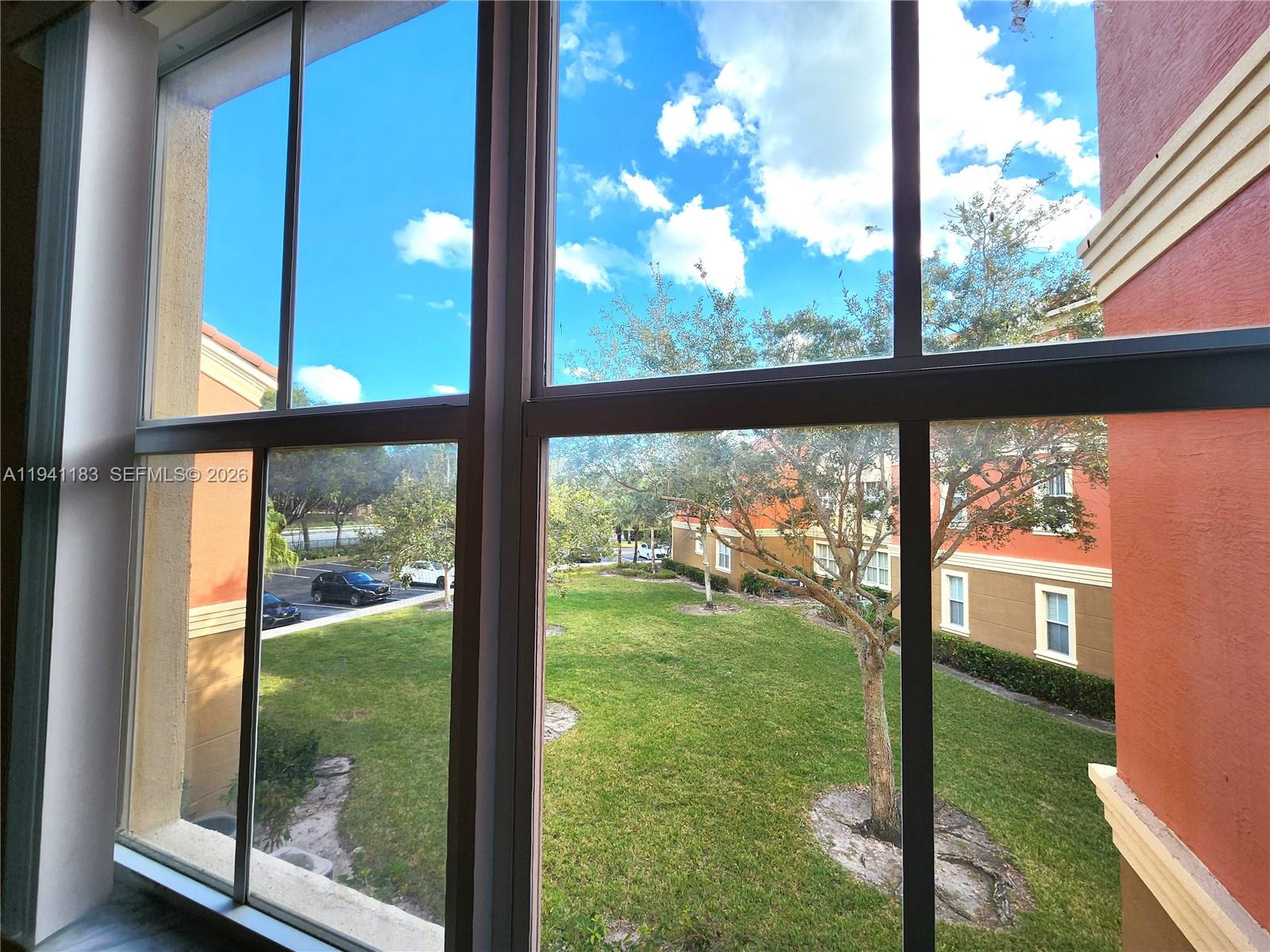 4602 Southwest 160th Avenue, Unit 524 Miramar, FL 33027 - Photo 21 of 33 a view of backyard from window