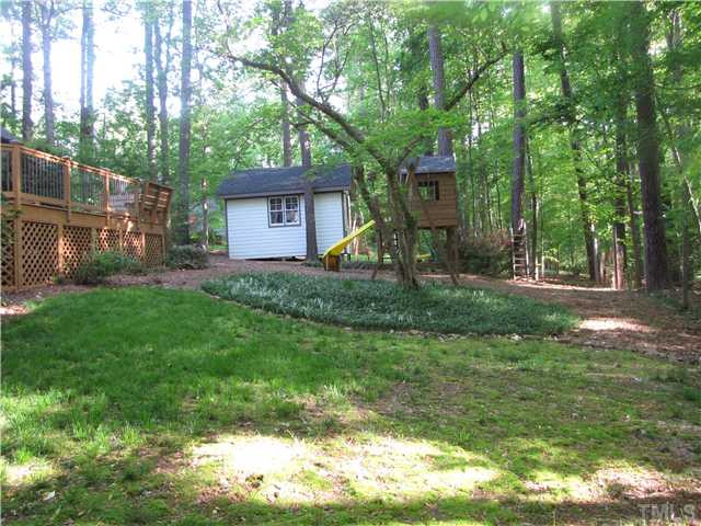8304 Heel Stone Court Raleigh, NC 27613 - Photo 23 of 25 The back yard is fenced and also has an invisible dog fence. Back Yard