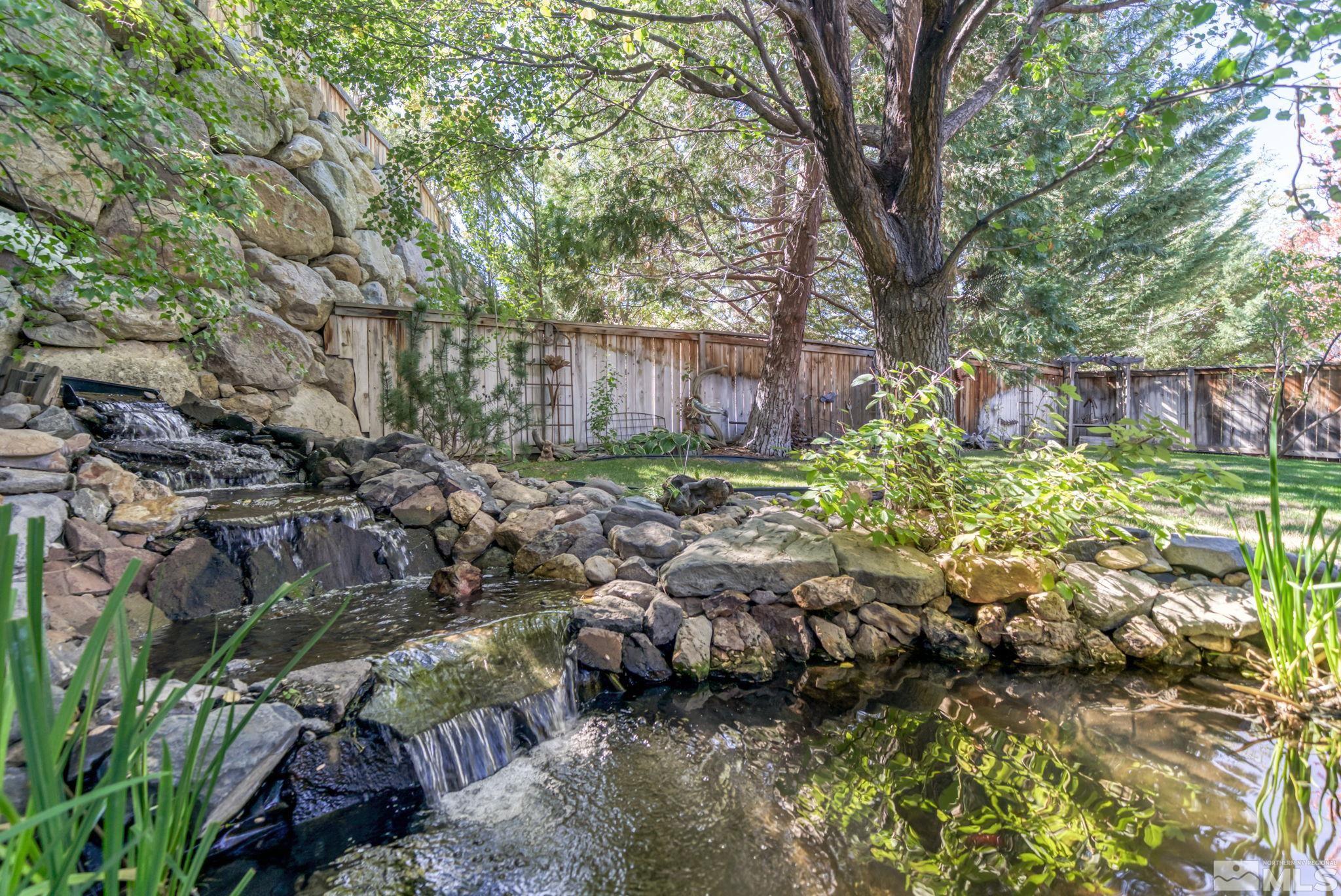 4958 Fall Creek Court Reno, NV 89519 - Photo 2 of 40 a view of outdoor space and a yard