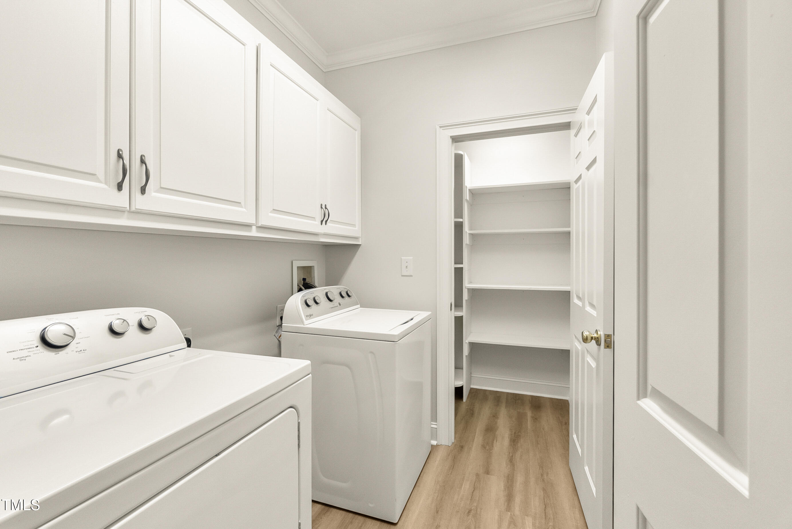 2819 Ellis Chapel Road Bahama, NC 27503 - Photo 14 of 22 a view of storage and utility room with washer and dryer