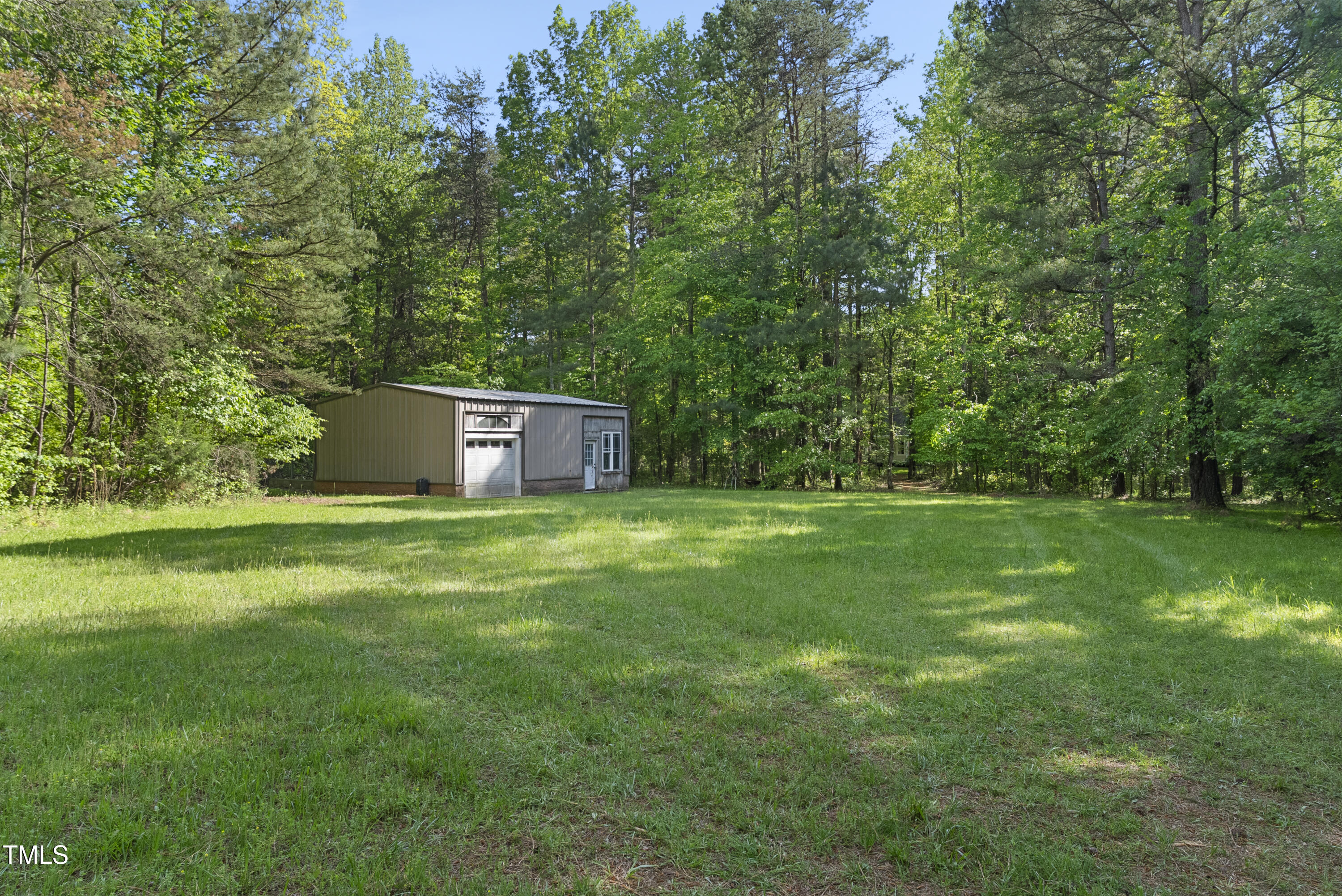 2819 Ellis Chapel Road Bahama, NC 27503 - Photo 17 of 22 a big yard with large trees