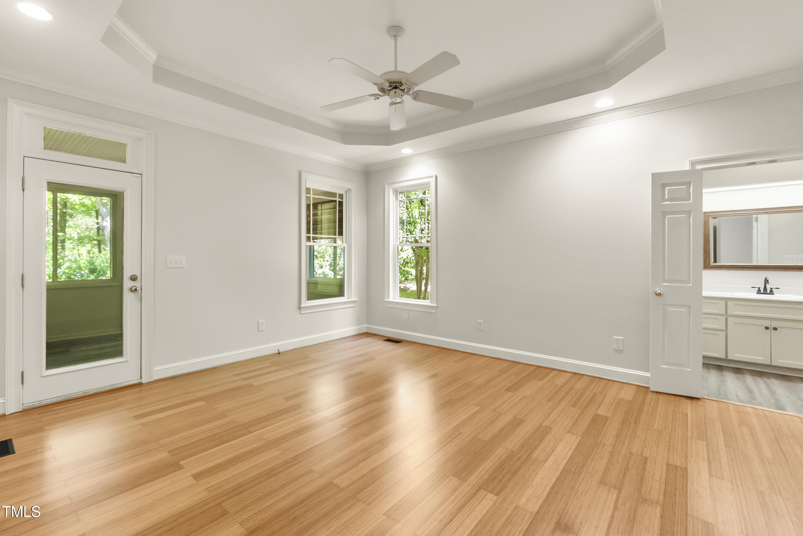 2819 Ellis Chapel Road Bahama, NC 27503 - Photo 10 of 22 wooden floor in an empty room with a window