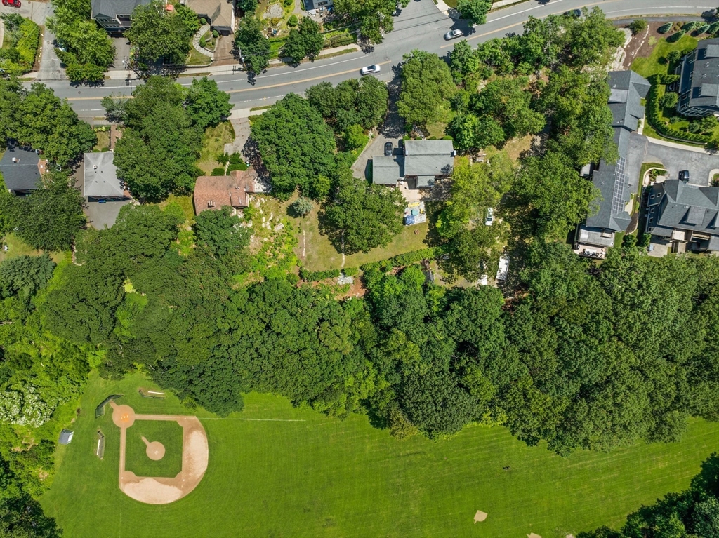 335 Langley Road Newton, MA 02459 - Photo 14 of 15 an aerial view of residential house with an outdoor space and seating