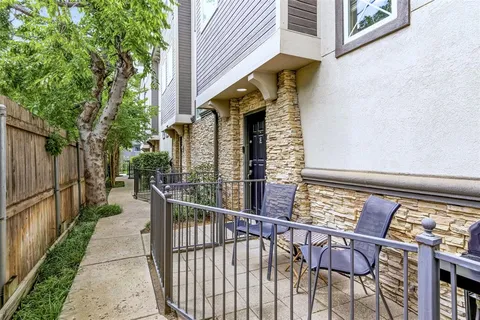 a view of balcony with furniture
