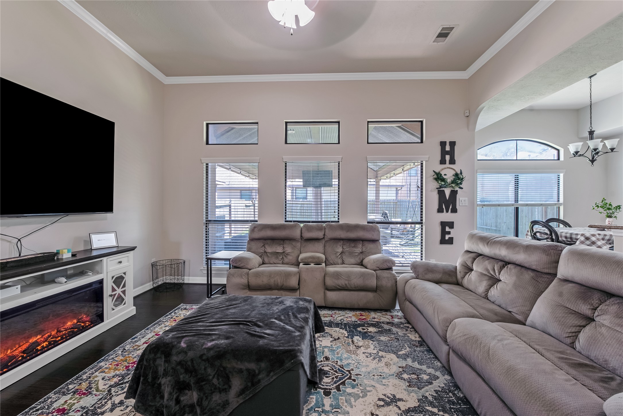 25118 Andris Lane Spring, TX 77386 - Photo 11 of 42 a living room with furniture and a flat screen tv