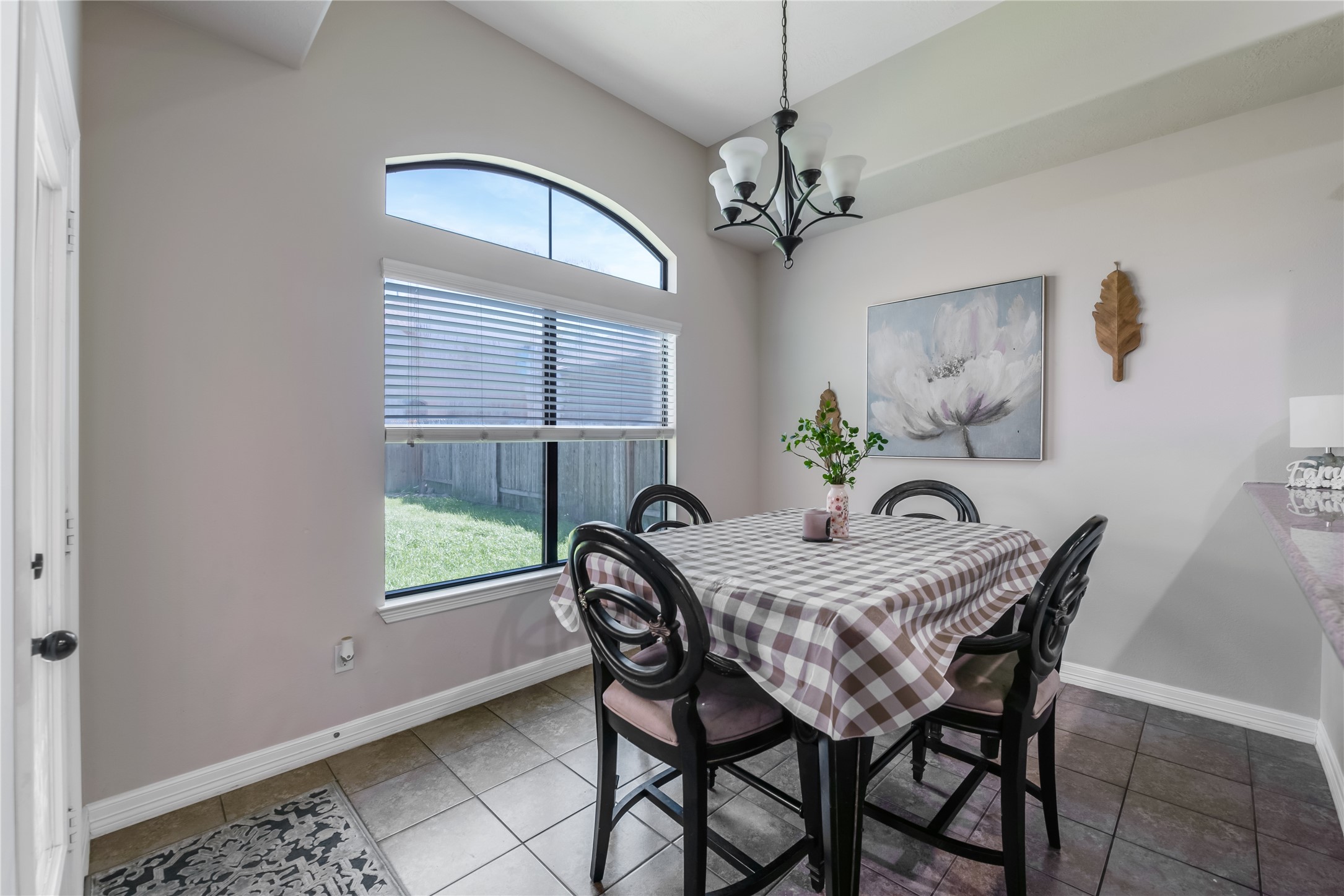 25118 Andris Lane Spring, TX 77386 - Photo 17 of 42 a view of a dining room with furniture a chandelier and window