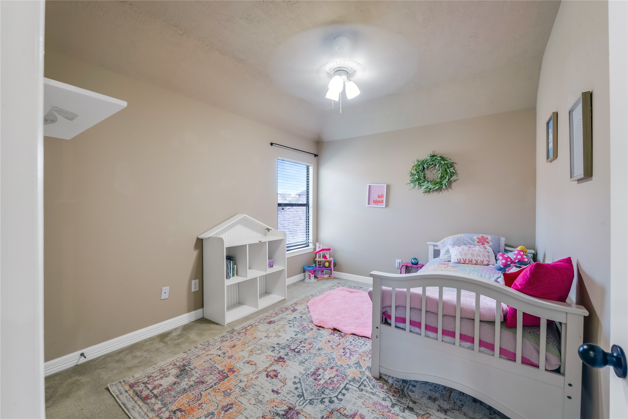 25118 Andris Lane Spring, TX 77386 - Photo 29 of 42 a bedroom with furniture and a baby crib