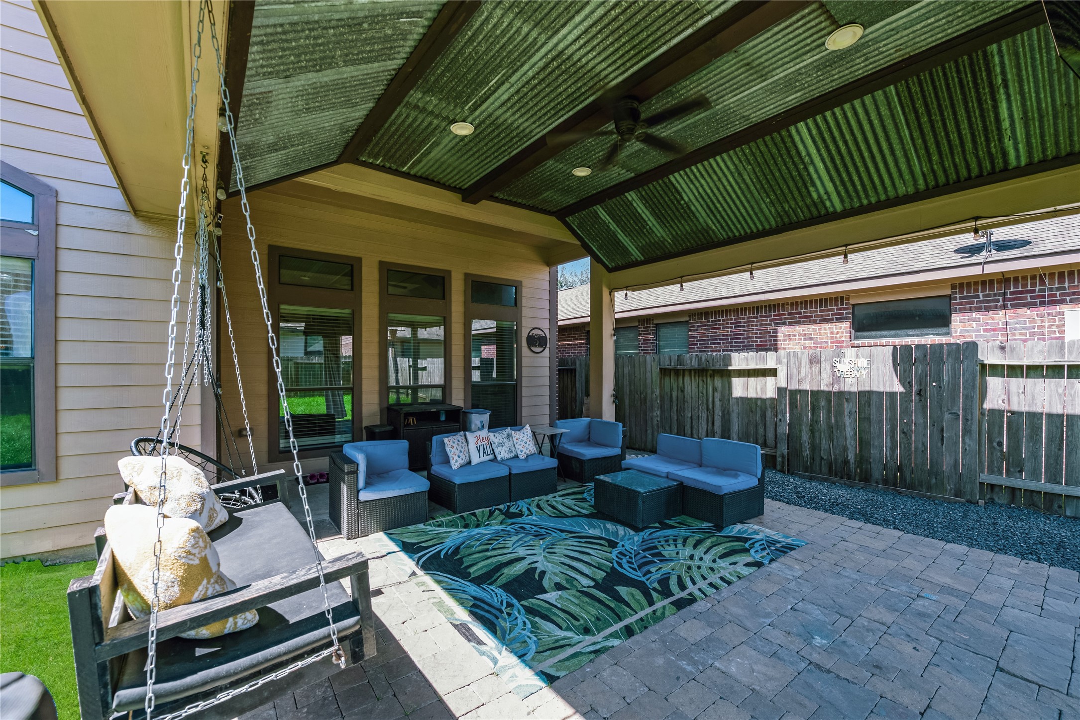 25118 Andris Lane Spring, TX 77386 - Photo 32 of 42 a view of a backyard with furniture and outdoor seating