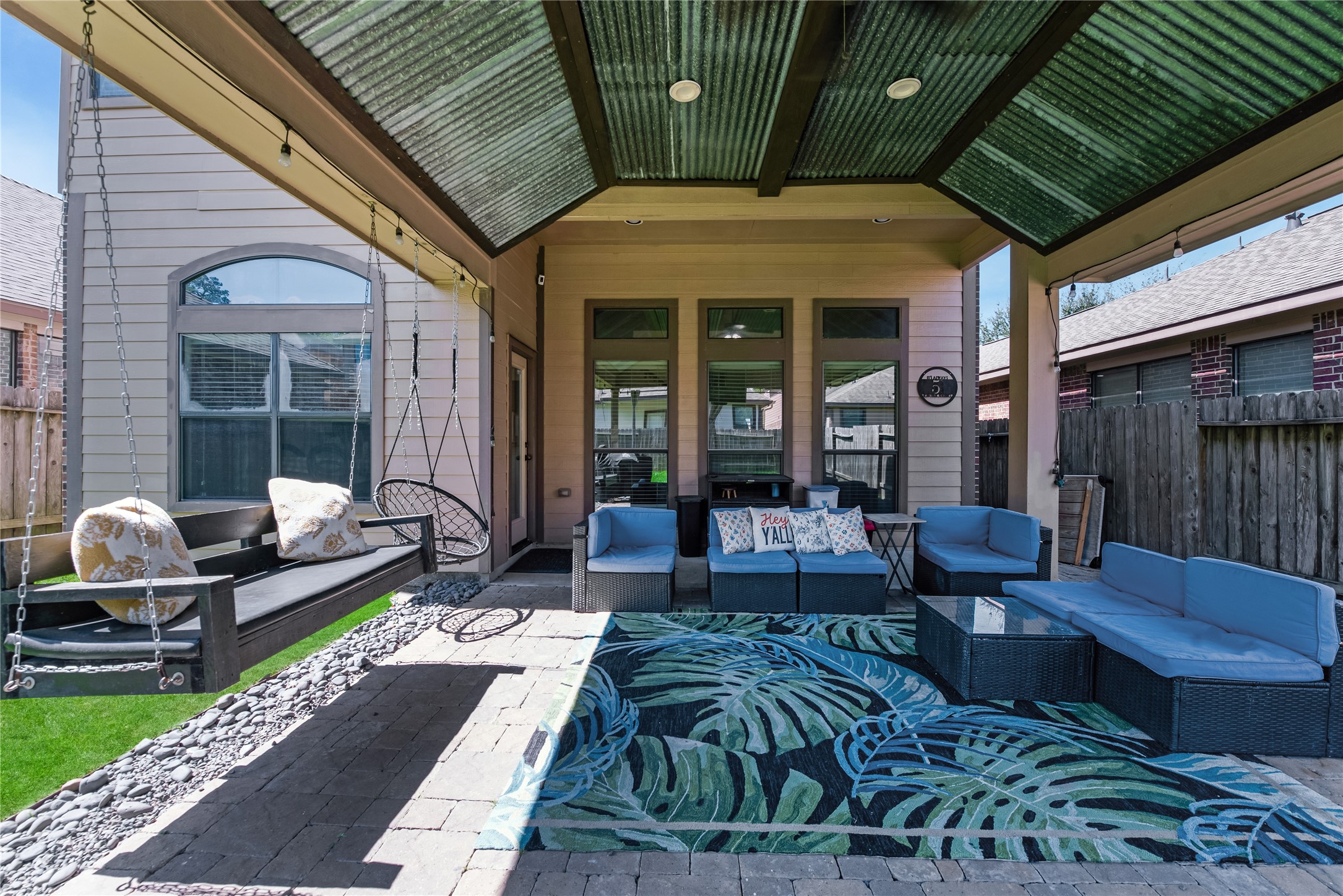 25118 Andris Lane Spring, TX 77386 - Photo 40 of 42 a view of a patio with table and chairs and potted plants