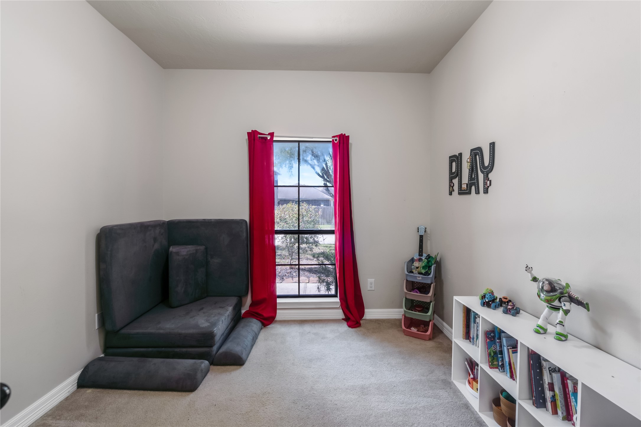 25118 Andris Lane Spring, TX 77386 - Photo 6 of 42 a living room with furniture and a window