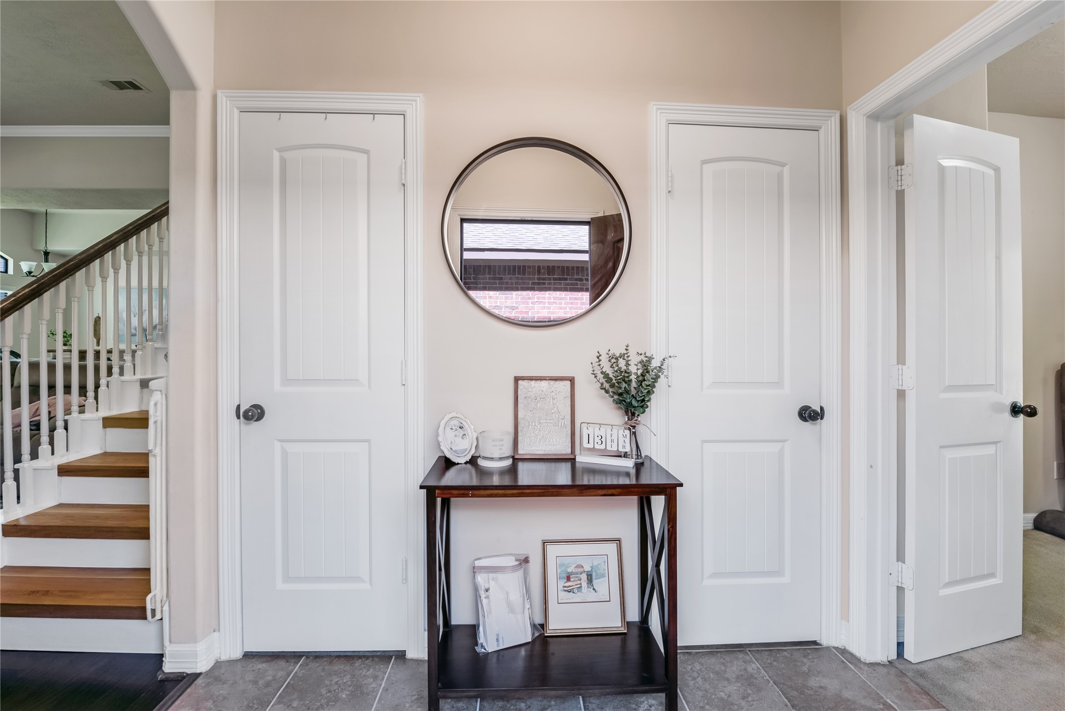 25118 Andris Lane Spring, TX 77386 - Photo 7 of 42 a front view of a house with entryway wooden floor and glass door