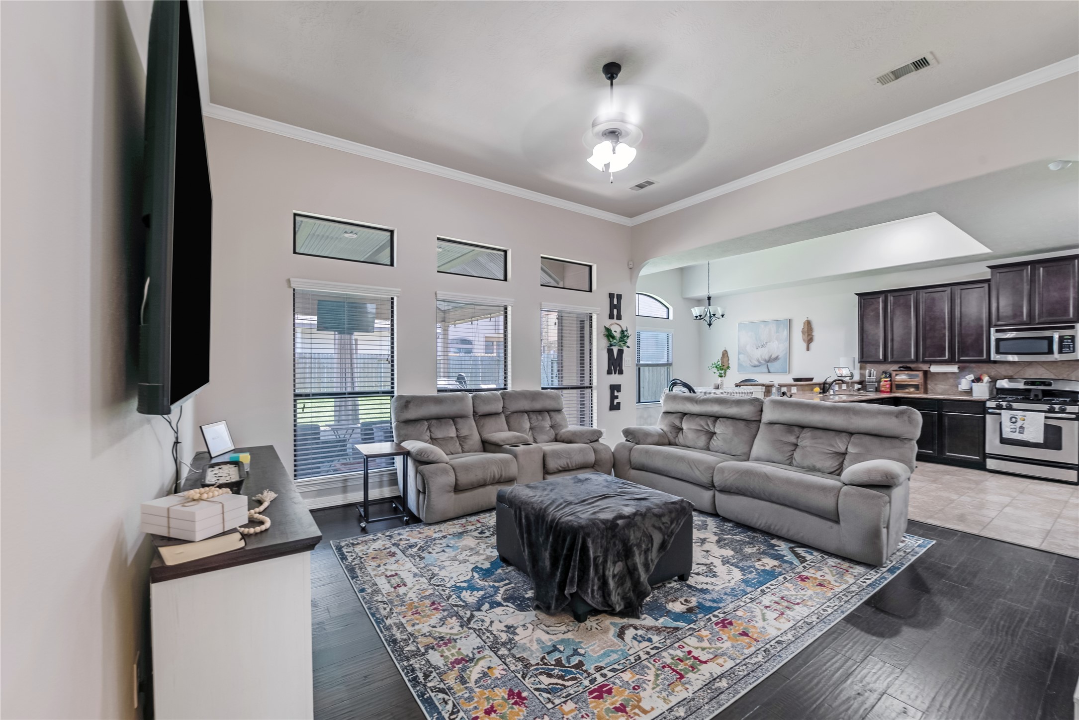 25118 Andris Lane Spring, TX 77386 - Photo 10 of 42 a living room with furniture and a flat screen tv
