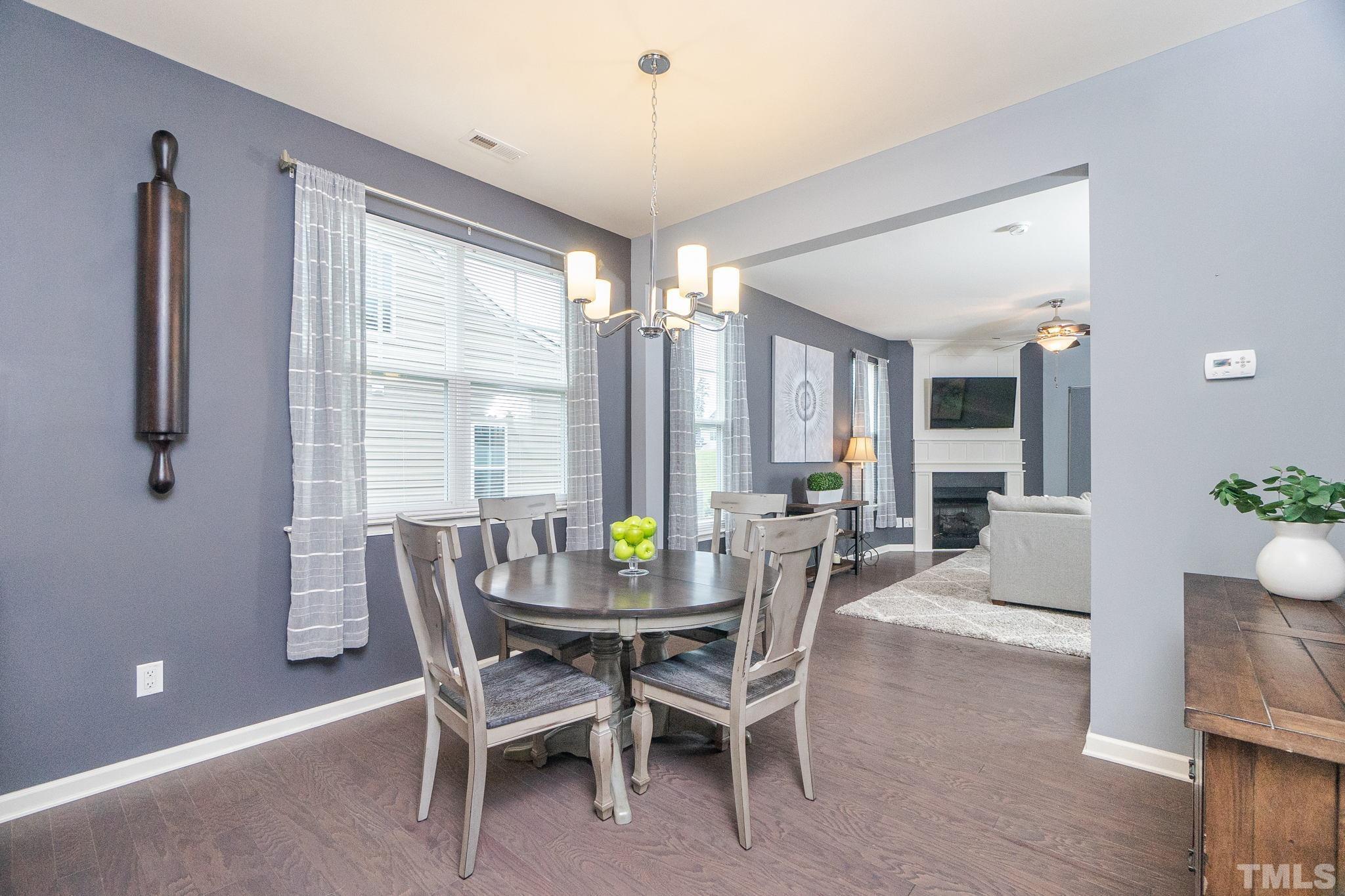 219 Torpoint Road Durham, NC 27703 - Photo 13 of 43 a view of a dining room with furniture and window