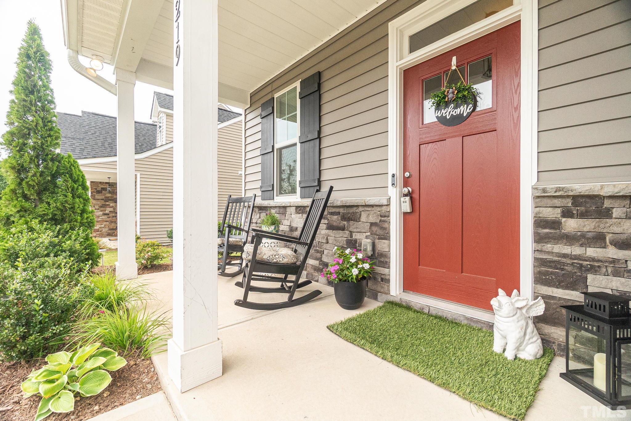 219 Torpoint Road Durham, NC 27703 - Photo 2 of 43 a view of a door and chair in the patio