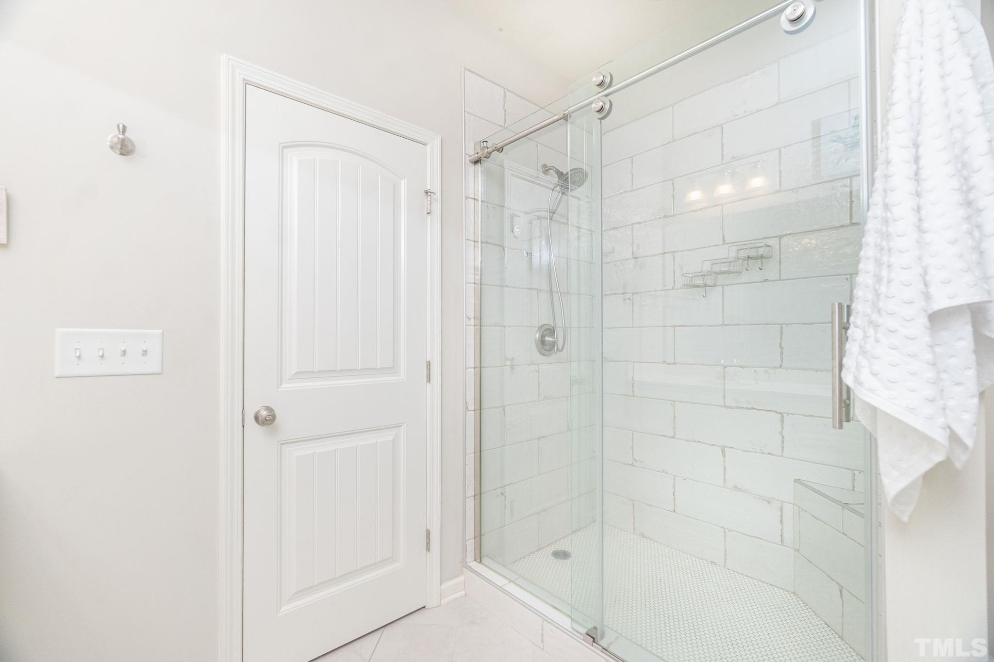 219 Torpoint Road Durham, NC 27703 - Photo 25 of 43 a bathroom with a shower