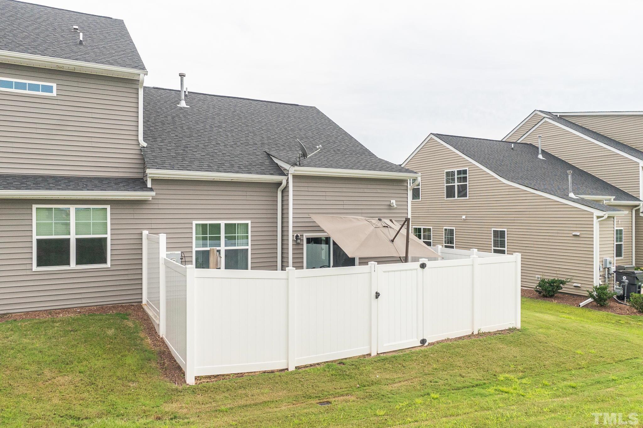 219 Torpoint Road Durham, NC 27703 - Photo 34 of 43 a view of a house with a big yard