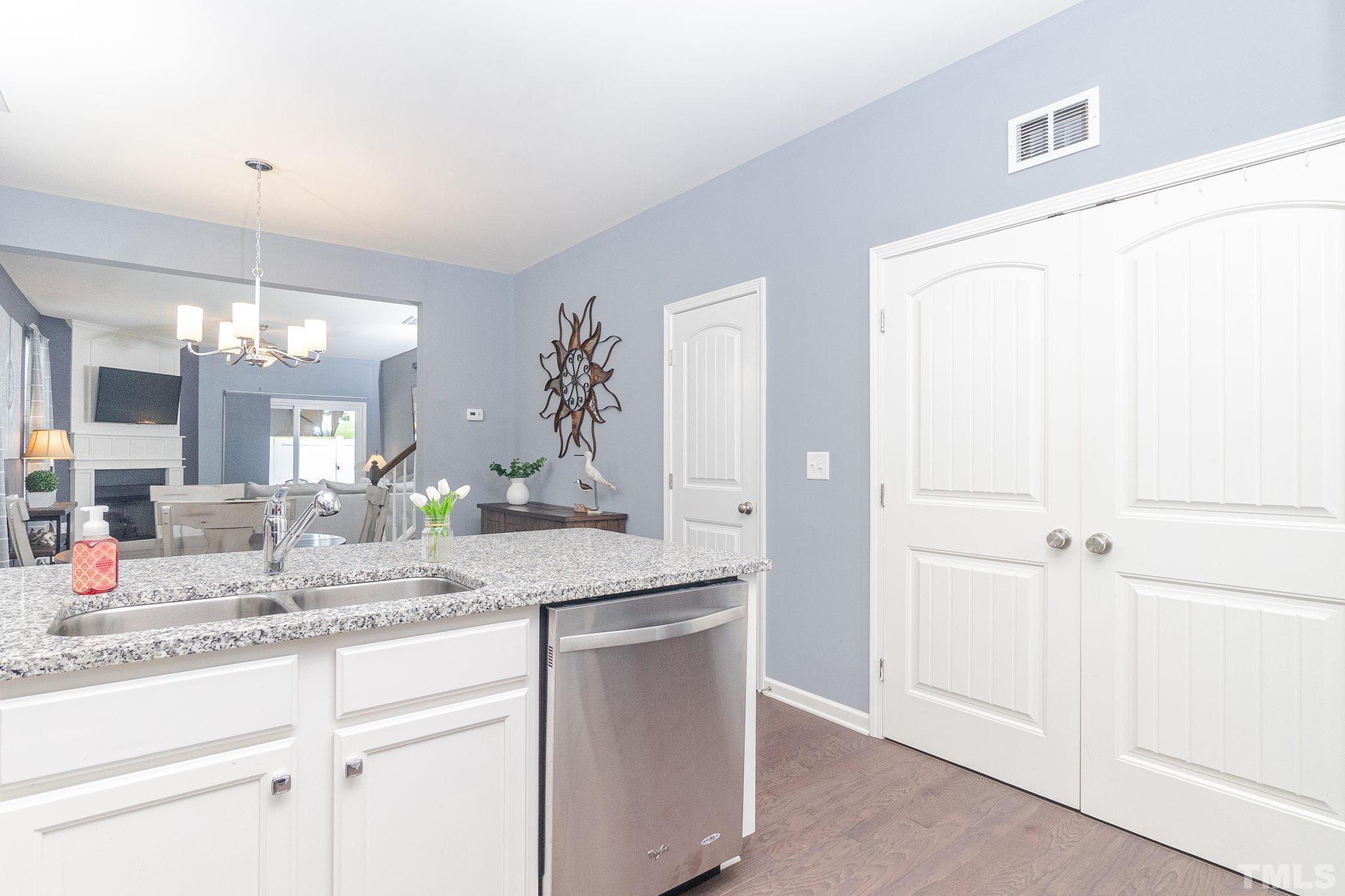 219 Torpoint Road Durham, NC 27703 - Photo 10 of 43 a bathroom with a sink and a mirror
