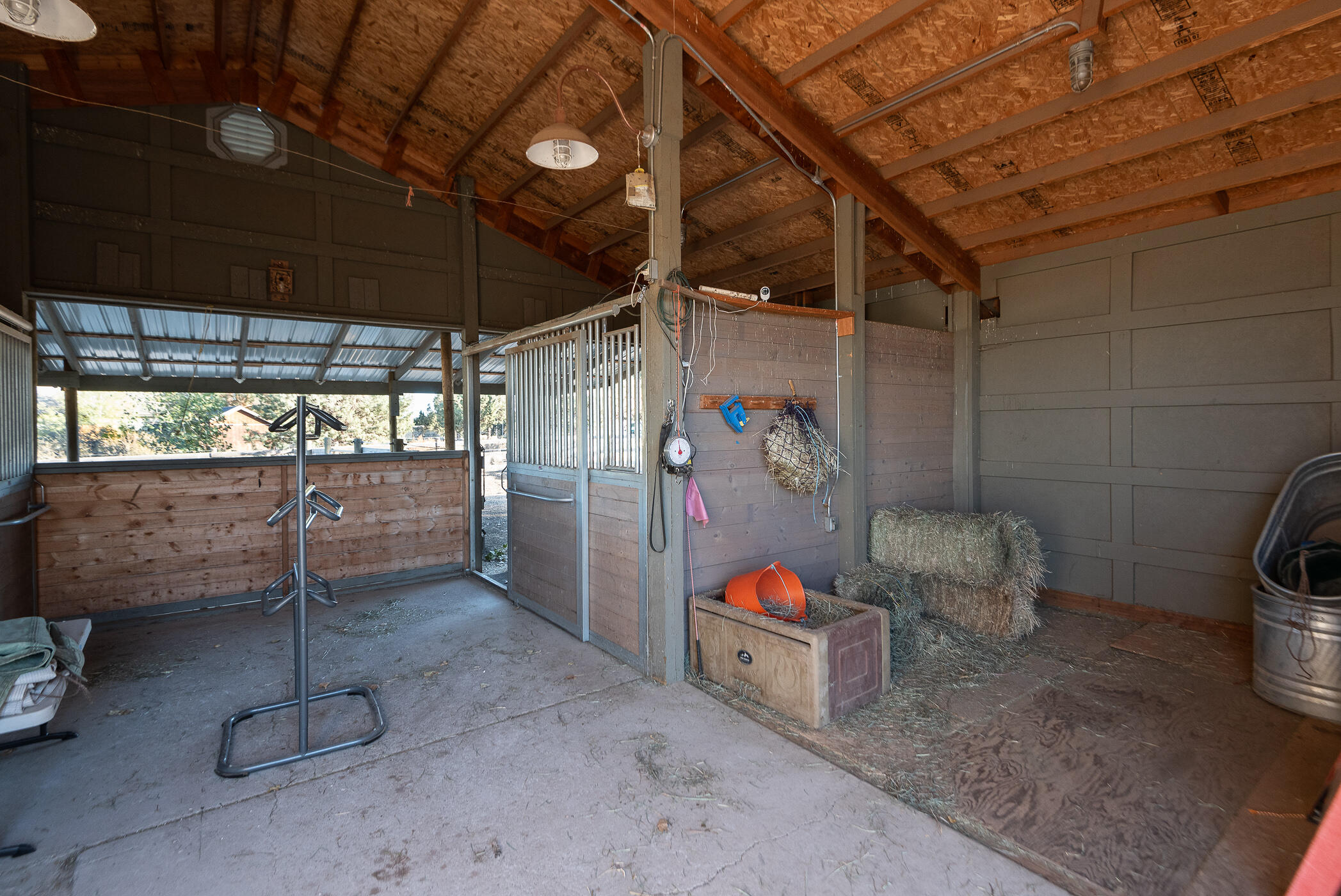 60835 Jennings Road Bend, OR 97702 - Photo 46 of 53 Main aisle and hay storage