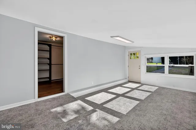 an empty room with closet