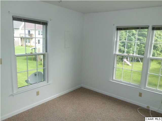 336 Minor Ridge Road Charlottesville, VA 22901 - Photo 11 of 20 an empty room with a window