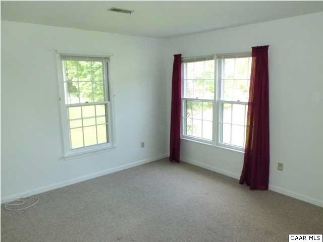 336 Minor Ridge Road Charlottesville, VA 22901 - Photo 13 of 20 an empty room with a window