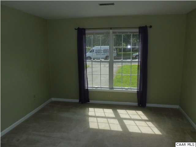 336 Minor Ridge Road Charlottesville, VA 22901 - Photo 15 of 20 a view of an empty room with a window