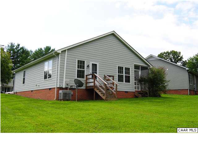 336 Minor Ridge Road Charlottesville, VA 22901 - Photo 16 of 20 a view of a house with a yard and porch