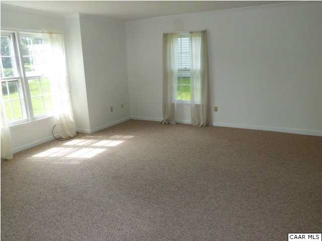 336 Minor Ridge Road Charlottesville, VA 22901 - Photo 4 of 20 an empty room with windows