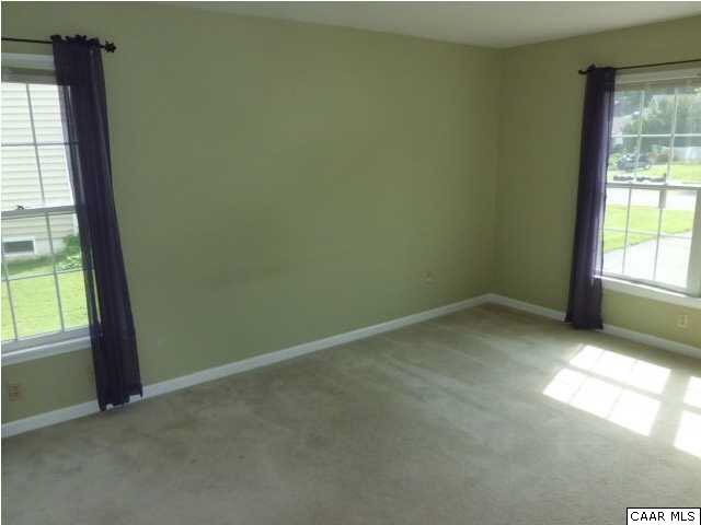 336 Minor Ridge Road Charlottesville, VA 22901 - Photo 10 of 20 an empty room with windows