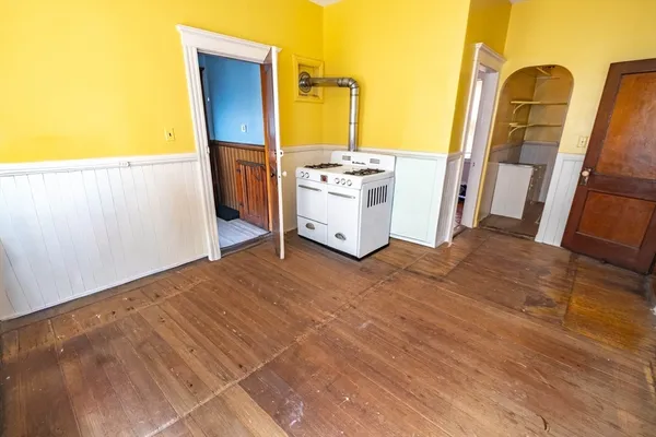a view of a kitchen with utility and a sink