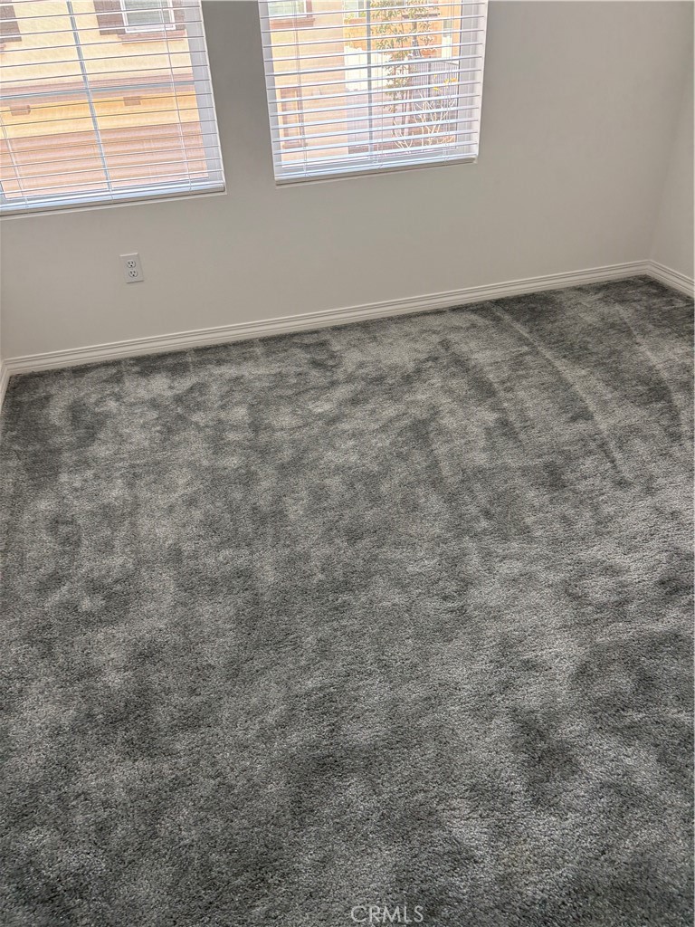 2544 Gunner Ridge Way Rialto, CA 92377 - Photo 11 of 22 a view of a window in an empty room