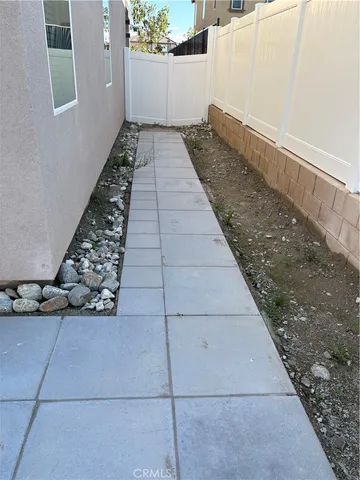 a view of a pathway door with wooden floor
