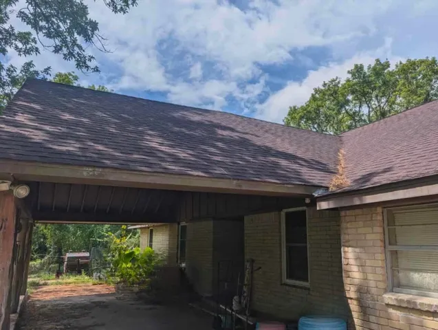 a backyard of a house with lots of green space