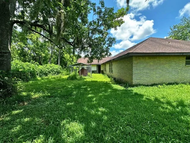 a view of a backyard with a garden