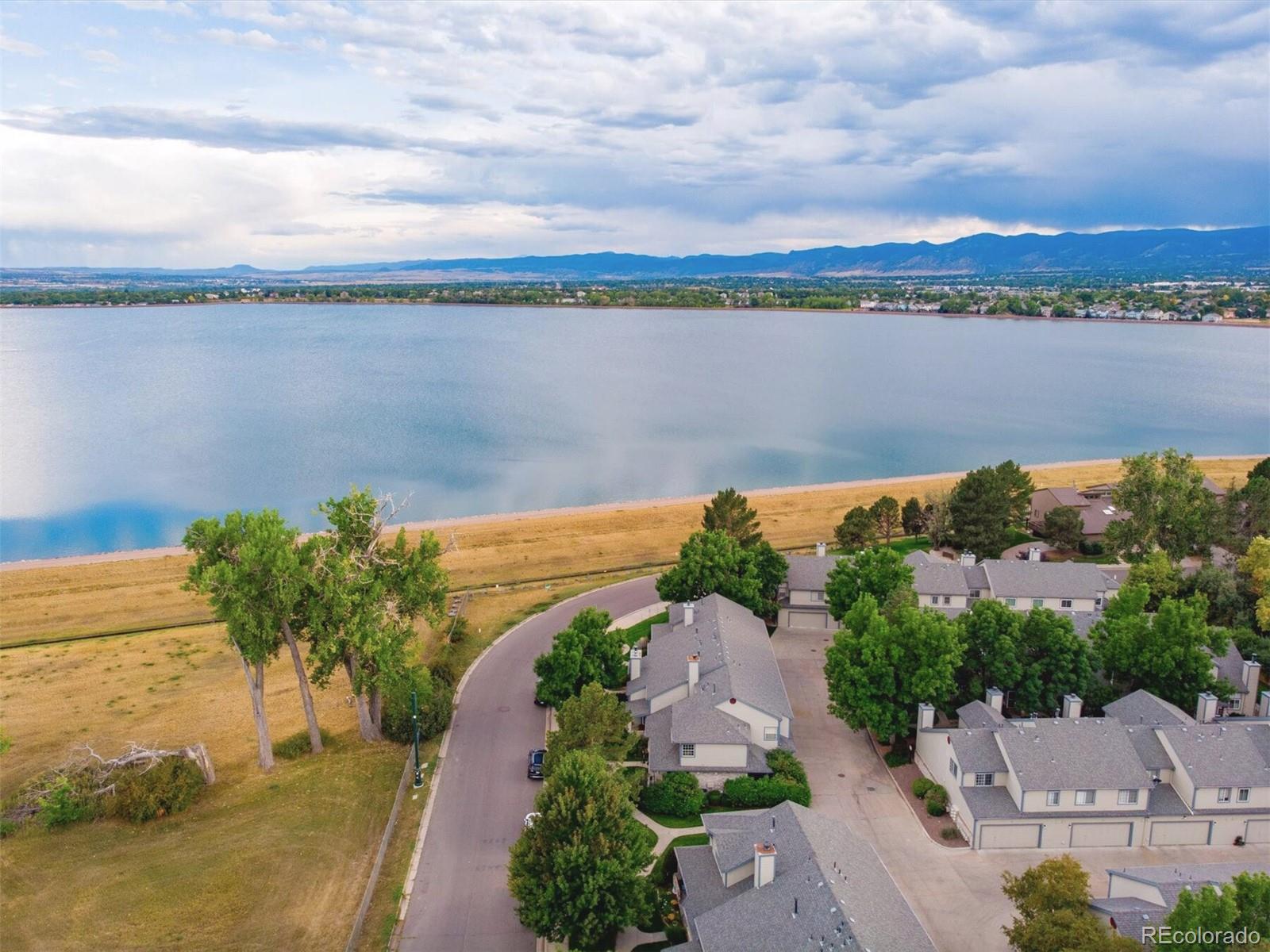 4301 South Pierce Street, Unit 2D Denver, CO 80123 - Photo 31 of 39 a view of a lake with a city