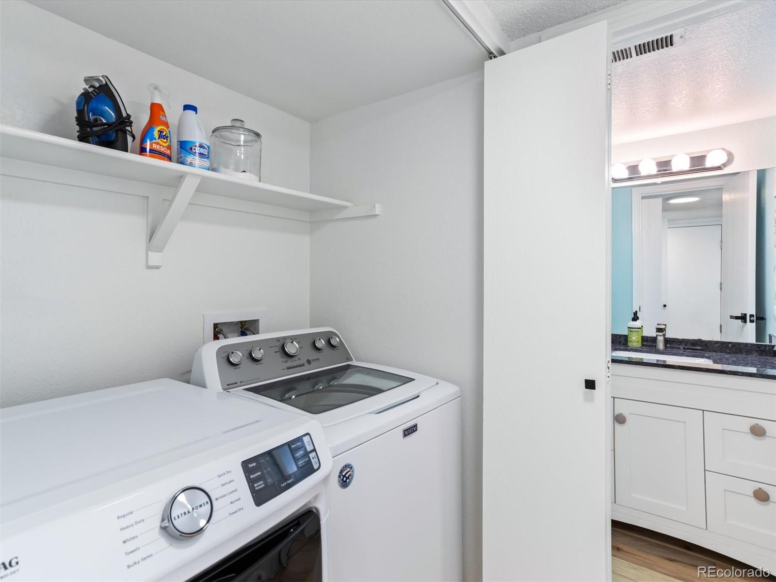 4301 South Pierce Street, Unit 2D Denver, CO 80123 - Photo 10 of 39 a utility room with dryer and washer