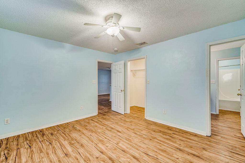 1003 Pinetree Road Mary Esther, FL 32569 - Photo 16 of 29 a view of empty room with wooden floor