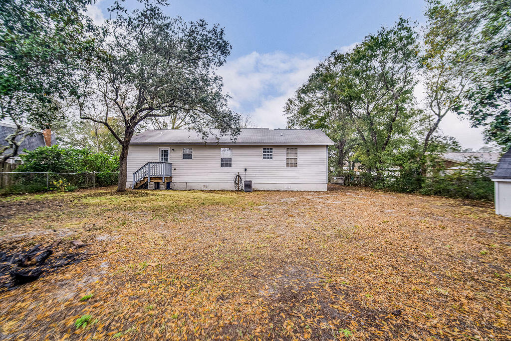1003 Pinetree Road Mary Esther, FL 32569 - Photo 28 of 29 a front view of house with yard and trees