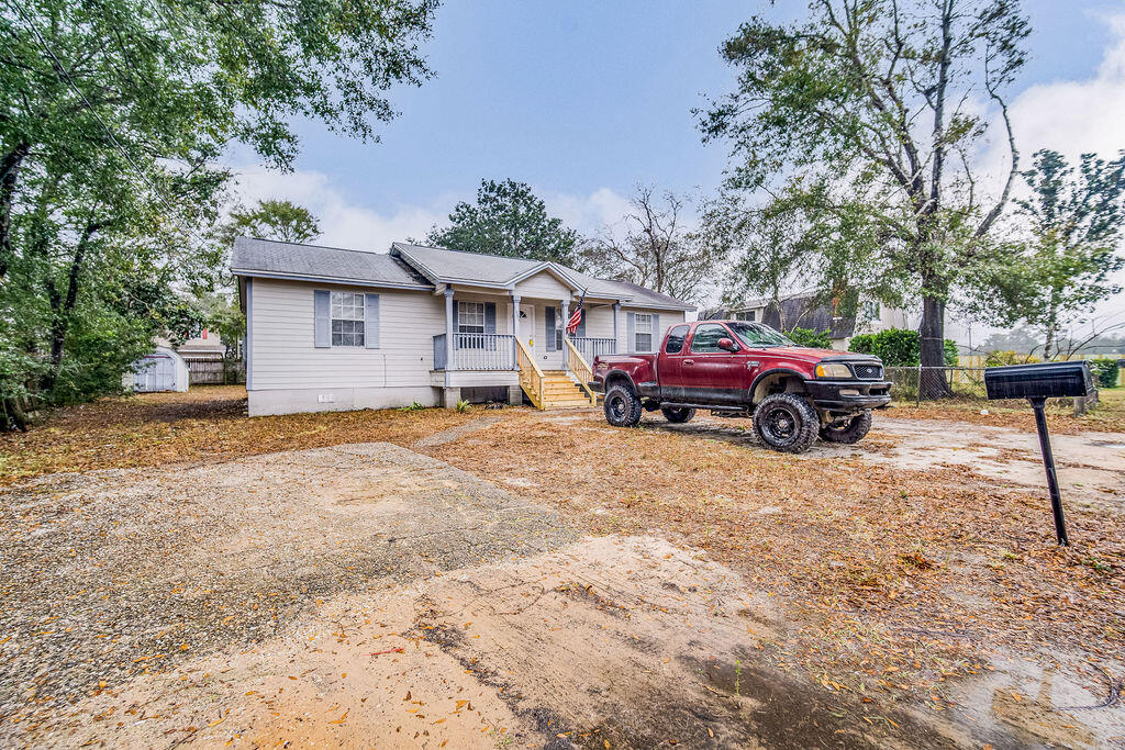 1003 Pinetree Road Mary Esther, FL 32569 - Photo 3 of 29 a house view with a outdoor space