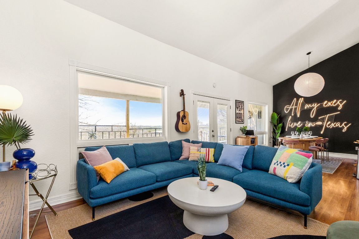 3306 Hyclimb Circle, Unit A Austin, TX 78723 - Photo 11 of 26 a living room with furniture and a large window