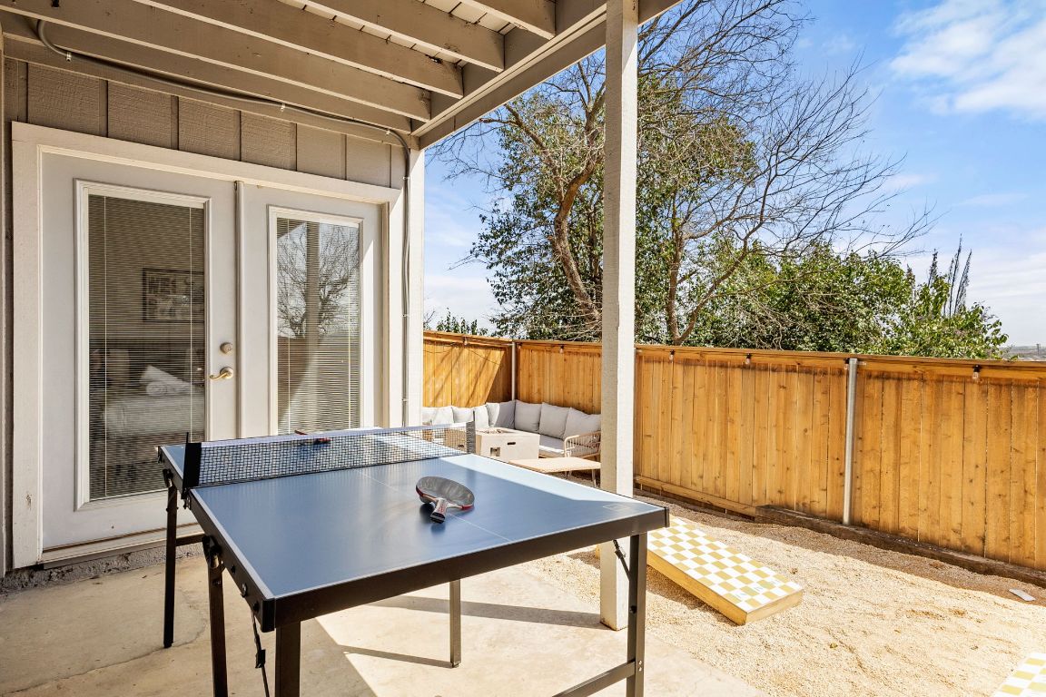 3306 Hyclimb Circle, Unit A Austin, TX 78723 - Photo 21 of 26 a view of a patio with a table and chairs